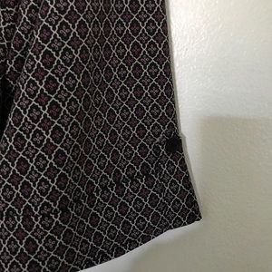 Nice work shirt. Pretty pattern with blacks/ purples. Never worn